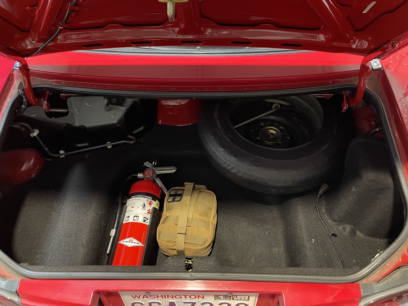 Fire extinguisher installed in my Miata's trunk