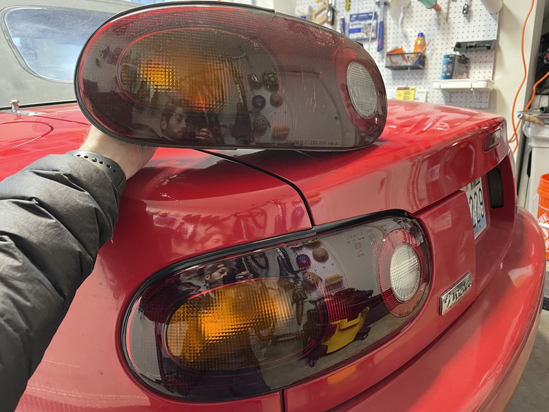 Old tail light next to the newly installed one